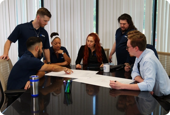 Tempo team meeting around a conference table